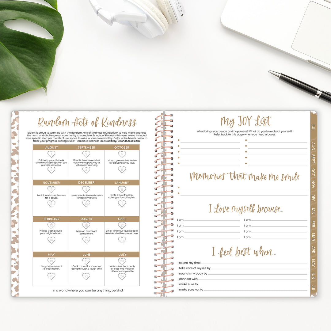 Kindness challenge and joy list spread in a weekly planner. 