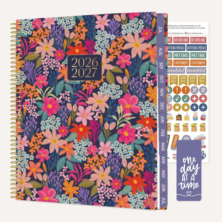 Floral-patterned planner with 2026-2027 dates, additional stickers, and a motivational quote bookmark.