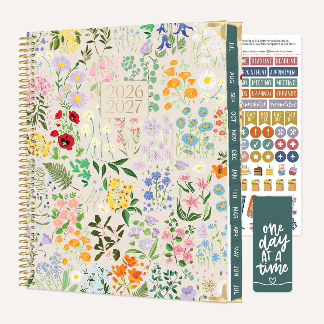 Floral patterned planner with stickers on a white background