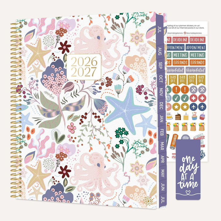 2026-2027 planner with ocean-themed cover and sticker sheet on a white background