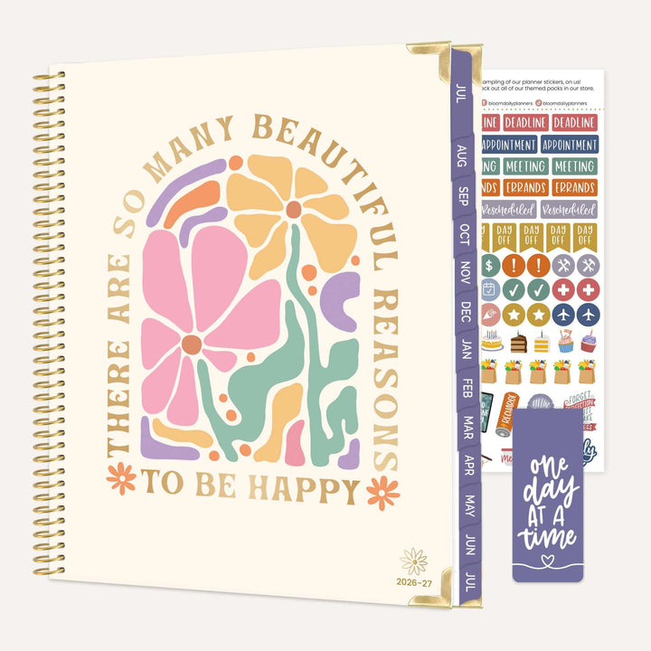 Planner with floral design and motivational quote, featuring a separate sheet of stickers.